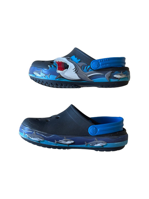 A Blue Slip Ons from Crocs in size 5T for boy. (Back View)