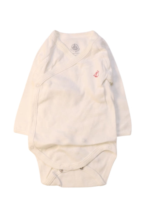 A Ivory Long Sleeve Bodysuits from Petit Bateau in size 0-3M for neutral. (Front View)