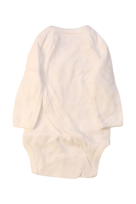 A Ivory Long Sleeve Bodysuits from Petit Bateau in size 0-3M for neutral. (Back View)