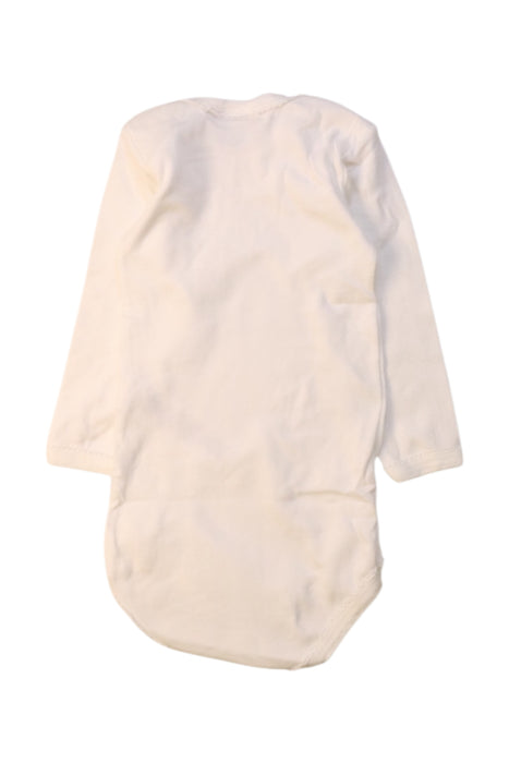 A White Long Sleeve Bodysuits from Petit Bateau in size 6-12M for girl. (Back View)