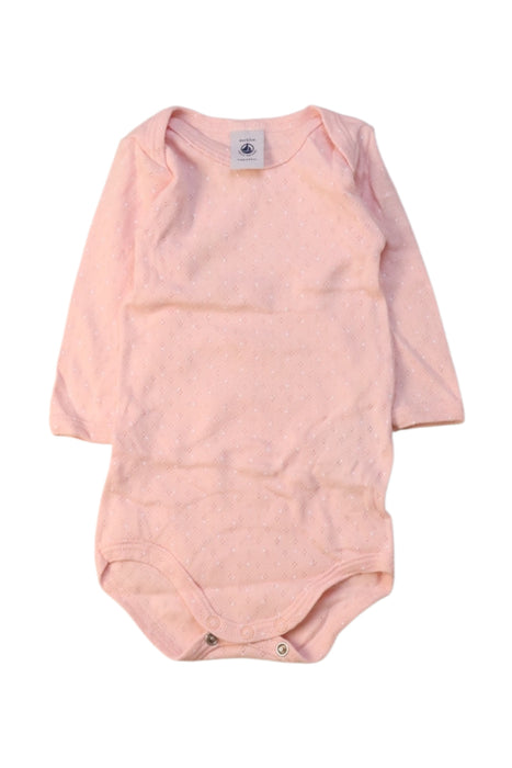 A Pink Long Sleeve Bodysuits from Petit Bateau in size 3-6M for girl. (Front View)