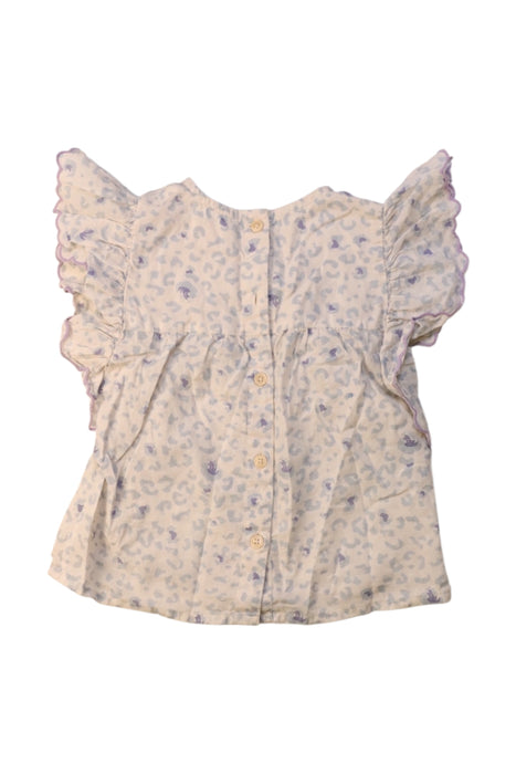 A Ivory Short Sleeve Tops from Louis Louise in size 2T for girl. (Back View)