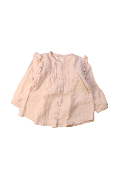 A Peach Long Sleeve Shirts from Jamie Kay in size 6-12M for girl. (Front View)