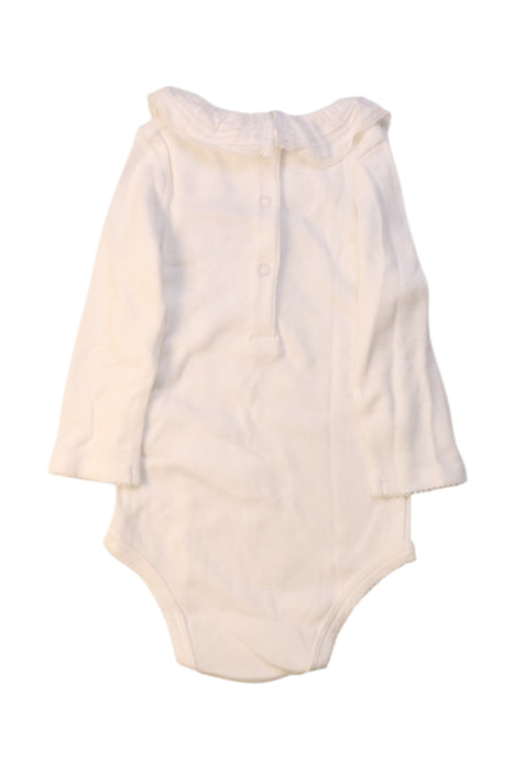 A White Long Sleeve Bodysuits from Cyrillus in size 6-12M for girl. (Back View)