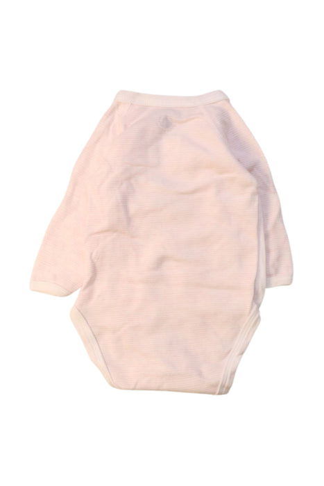 A Ivory Long Sleeve Bodysuits from Petit Bateau in size 0-3M for girl. (Back View)