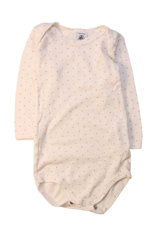 A White Long Sleeve Bodysuits from Petit Bateau in size 6-12M for girl. (Front View)