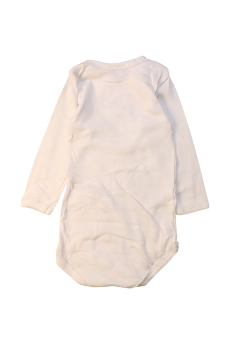 A White Long Sleeve Bodysuits from Petit Bateau in size 6-12M for girl. (Back View)
