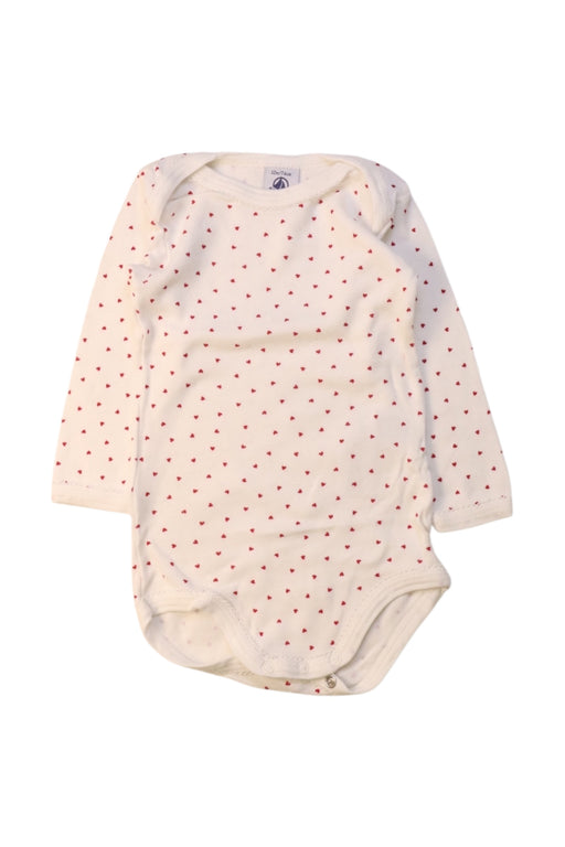 A White Long Sleeve Bodysuits from Petit Bateau in size 6-12M for girl. (Front View)