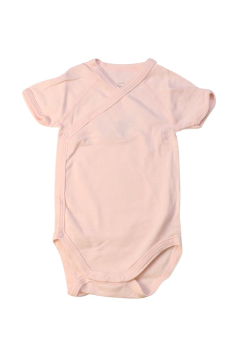 A Pink Short Sleeve Bodysuits from Petit Bateau in size 0-3M for girl. (Front View)