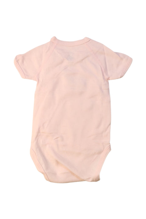 A Pink Short Sleeve Bodysuits from Petit Bateau in size 0-3M for girl. (Back View)