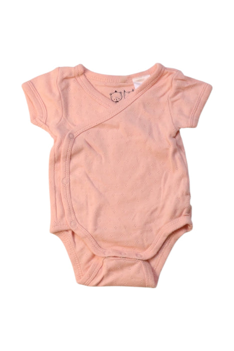 A Peach Short Sleeve Bodysuits from Wilson & Frenchy in size Newborn for girl. (Front View)