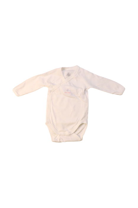 A White Long Sleeve Bodysuits from Petit Bateau in size 0-3M for girl. (Front View)