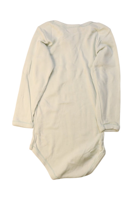A Ivory Long Sleeve Bodysuits from Petit Bateau in size 2T for girl. (Back View)