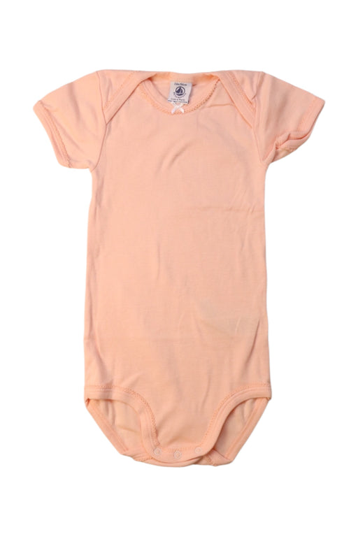 A Peach Short Sleeve Bodysuits from Petit Bateau in size 2T for girl. (Front View)