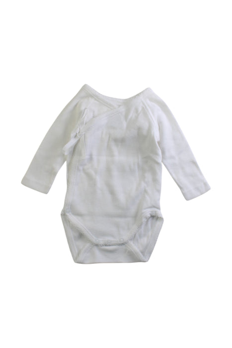 A White Long Sleeve Bodysuits from Petit Bateau in size 0-3M for girl. (Front View)