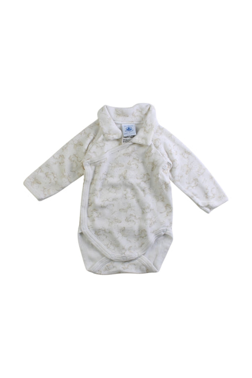 A White Long Sleeve Bodysuits from Petit Bateau in size Newborn for neutral. (Front View)