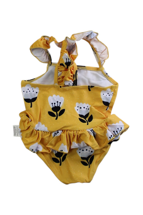 A Yellow Swimsuits from Cotton Pigs in size 3-6M for girl. (Back View)
