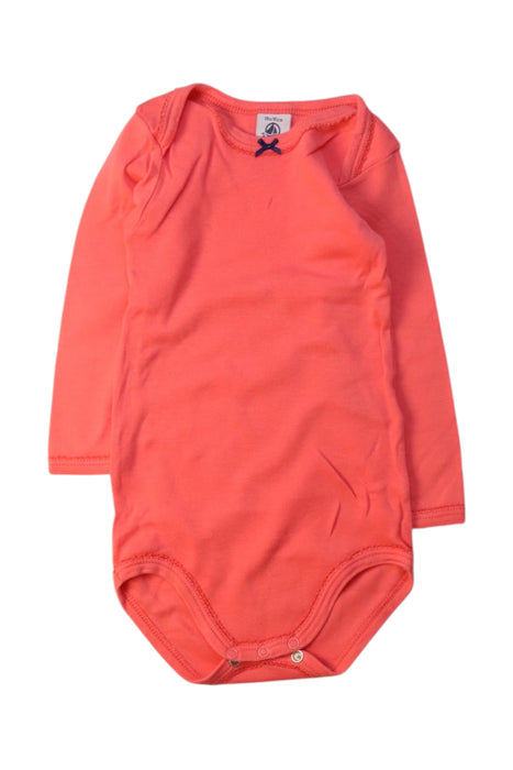 A Orange Long Sleeve Bodysuits from Petit Bateau in size 12-18M for girl. (Front View)
