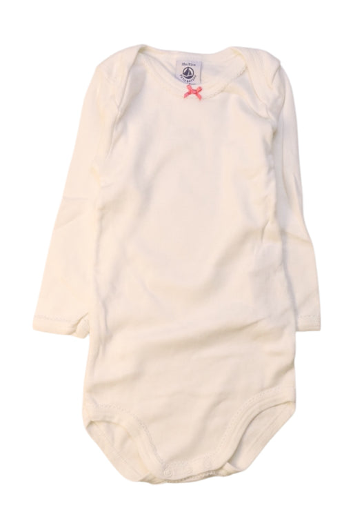 A White Long Sleeve Bodysuits from Petit Bateau in size 12-18M for girl. (Front View)