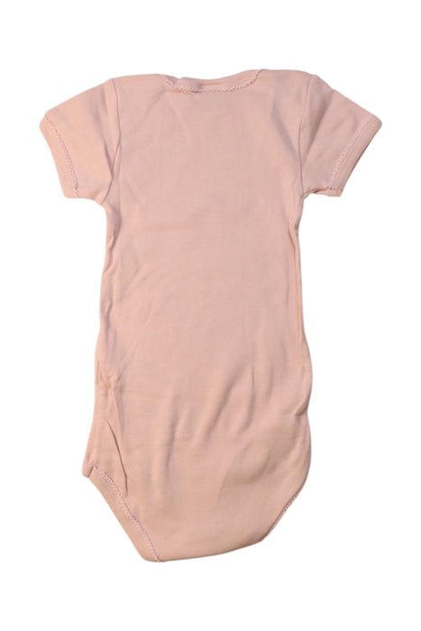 A Peach Short Sleeve Bodysuits from Petit Bateau in size 2T for girl. (Back View)