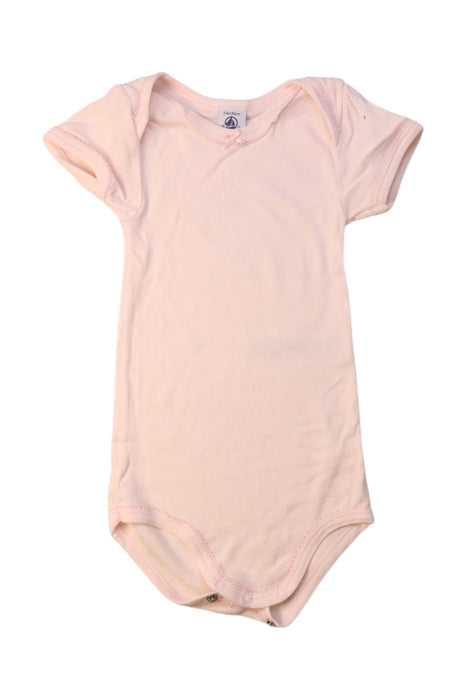 A Pink Short Sleeve Bodysuits from Petit Bateau in size 2T for girl. (Front View)