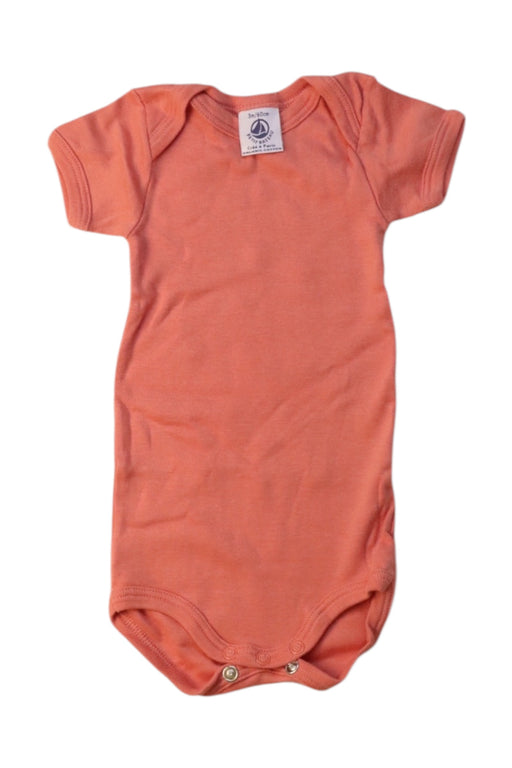 A Peach Short Sleeve Bodysuits from Petit Bateau in size 0-3M for girl. (Front View)