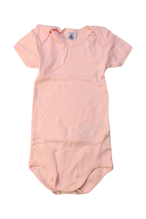 A Peach Short Sleeve Bodysuits from Petit Bateau in size 12-18M for girl. (Front View)