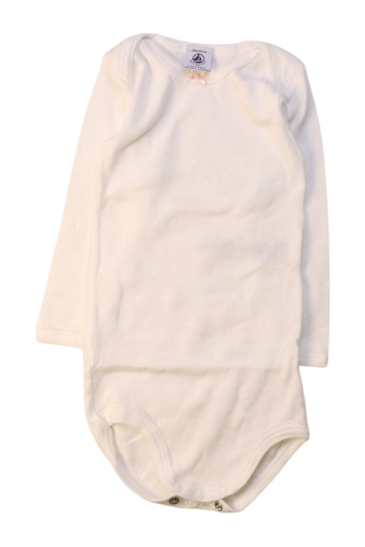A White Long Sleeve Bodysuits from Petit Bateau in size 12-18M for girl. (Front View)