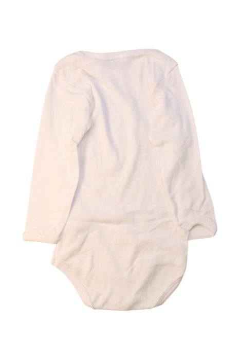 A White Long Sleeve Bodysuits from Petit Bateau in size 18-24M for girl. (Back View)
