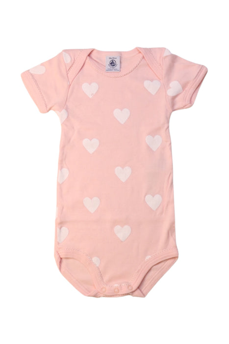A Pink Short Sleeve Bodysuits from Petit Bateau in size 12-18M for girl. (Front View)