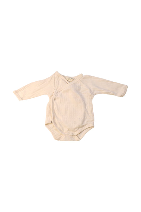 A Ivory Long Sleeve Bodysuits from Nature Baby in size Newborn for girl. (Front View)