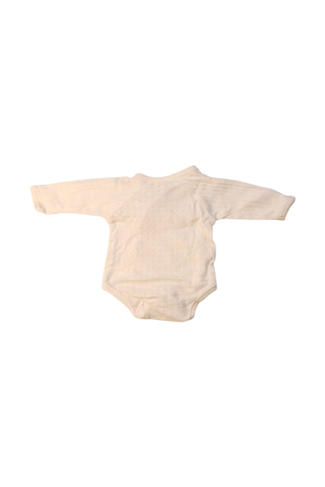 A Ivory Long Sleeve Bodysuits from Nature Baby in size Newborn for girl. (Back View)