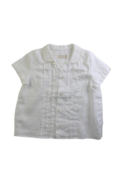 A White Short Sleeve Shirts from Tizzas in size 4T for girl. (Front View)
