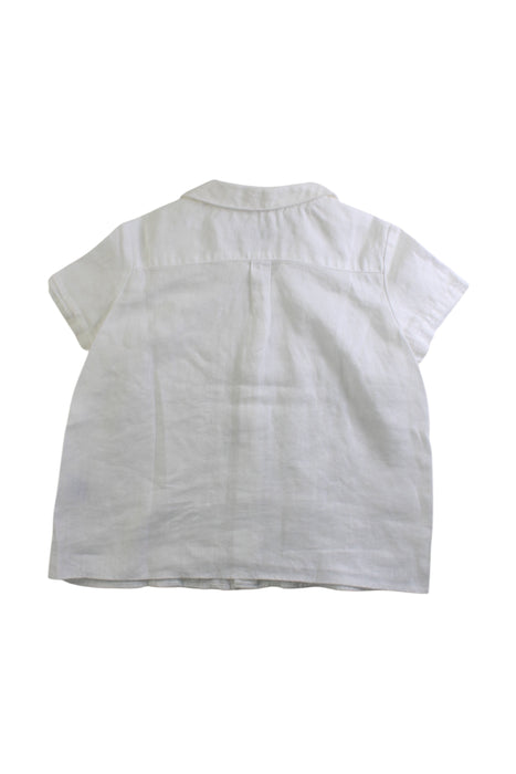 A White Short Sleeve Shirts from Tizzas in size 4T for girl. (Back View)
