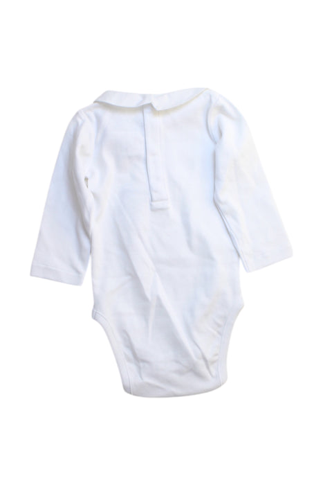 A White Long Sleeve Bodysuits from Jacadi in size 3-6M for girl. (Back View)