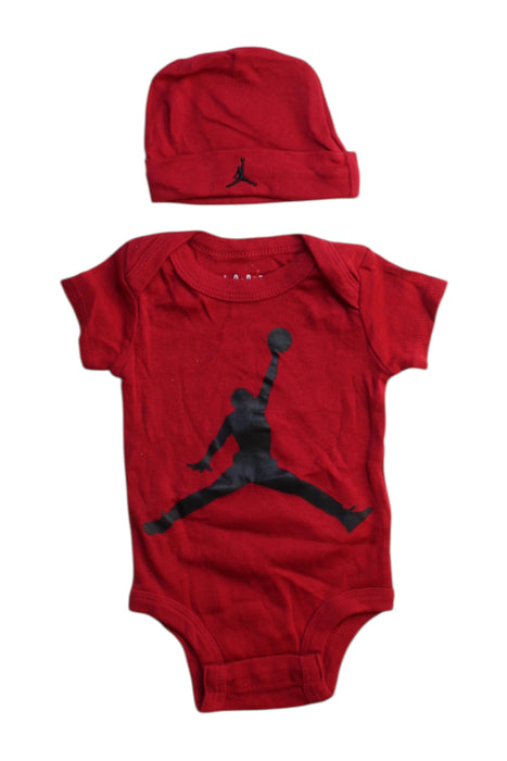 A Red Short Sleeve Bodysuits from Air Jordan in size 3-6M for boy. (Front View)