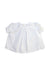 A White Short Sleeve Tops from Nanos in size 0-3M for girl. (Front View)