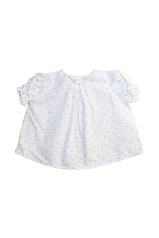 A White Short Sleeve Tops from Nanos in size 0-3M for girl. (Front View)