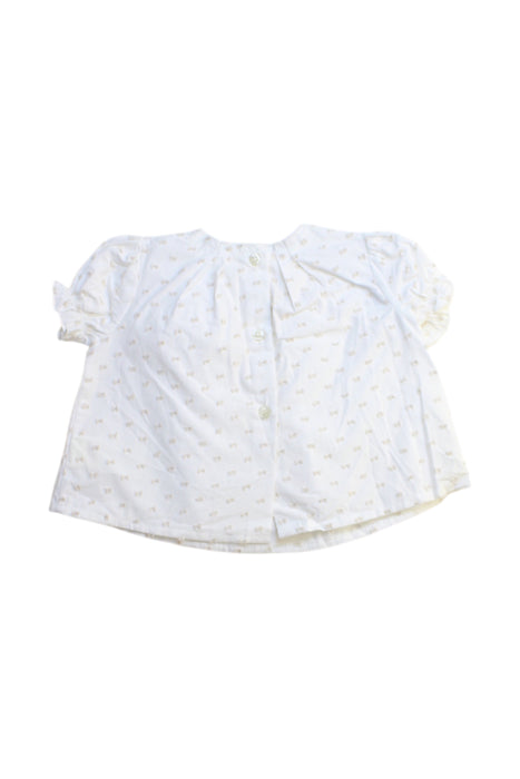 A White Short Sleeve Tops from Nanos in size 0-3M for girl. (Back View)