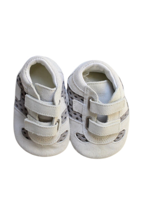 A White Booties from Hogan in size 6-12M for neutral. (Back View)