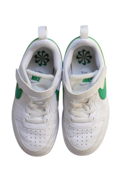A White Sneakers from Nike in size 5T for boy. (Back View)
