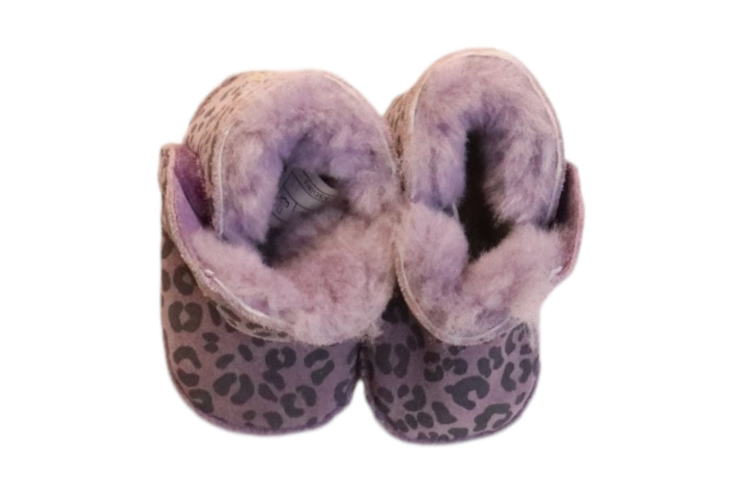 A Pink Booties from UGG in size Newborn for girl. (Back View)