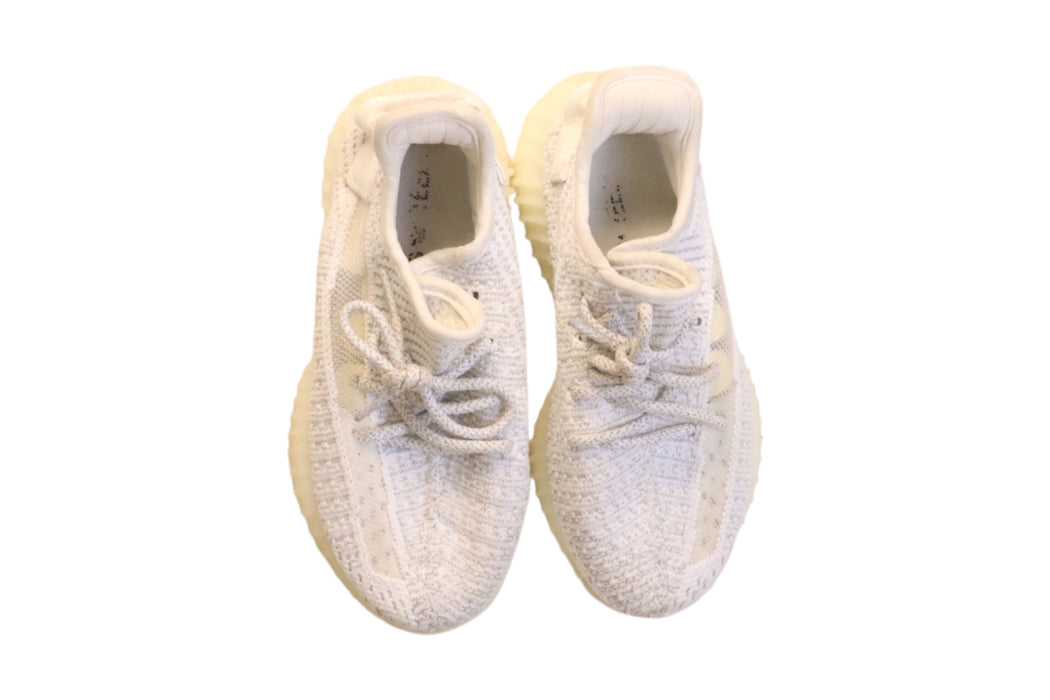 A Ivory Sneakers from Adidas Yeezy in size 11Y for boy. (Back View)