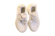 A Ivory Sneakers from Adidas Yeezy in size 11Y for boy. (Back View)