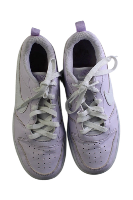 A Purple Sneakers from Nike in size 11Y for girl. (Back View)