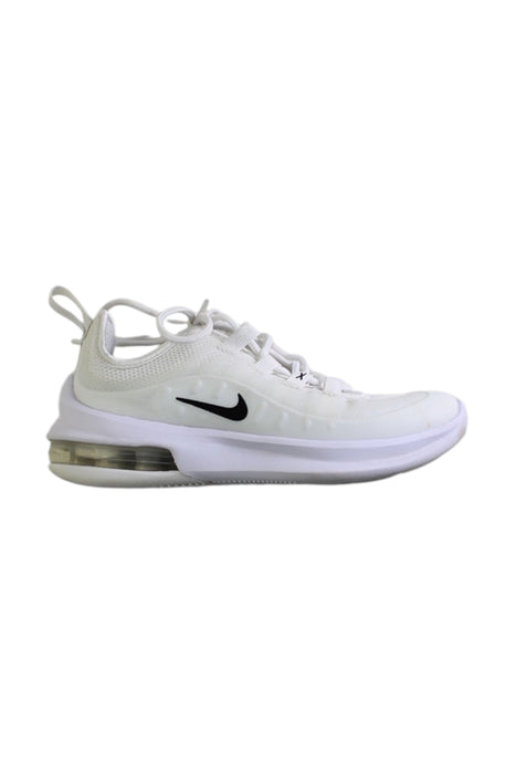 A White Sneakers from Nike in size 5T for girl. (Front View)
