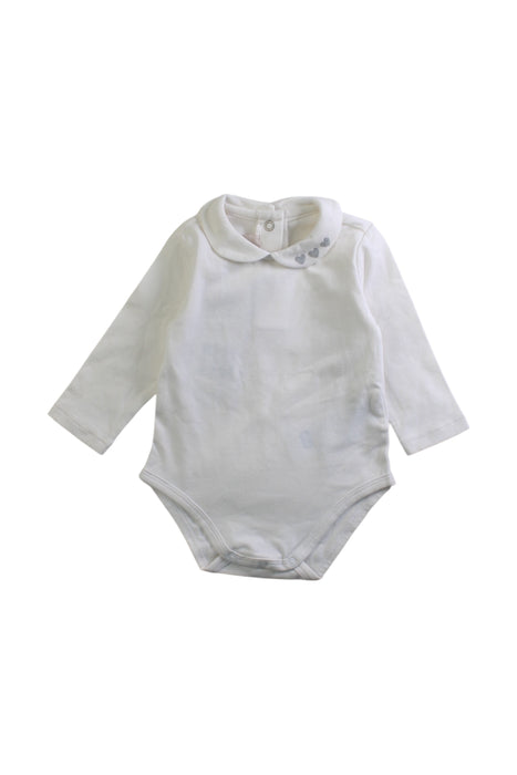 A White Long Sleeve Bodysuits from Chicco in size 0-3M for girl. (Front View)