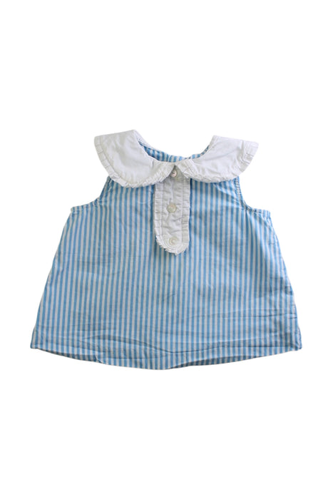 A Blue Sleeveless Tops from Jacadi in size 2T for girl. (Front View)