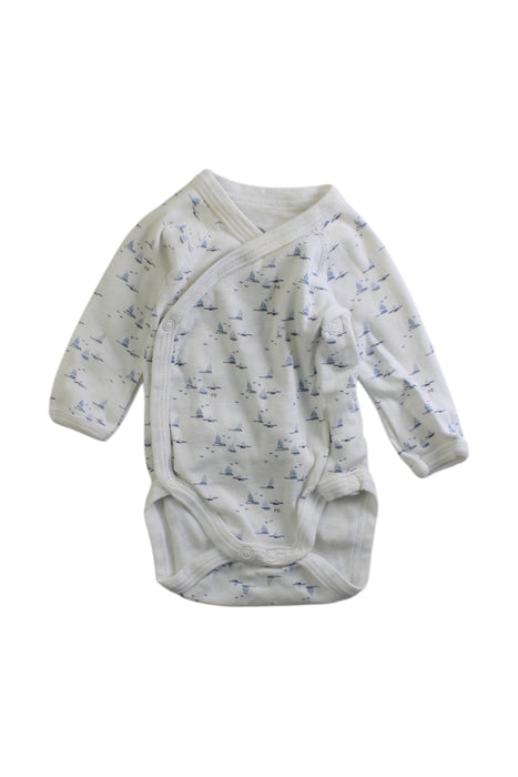 A White Long Sleeve Bodysuits from Petit Bateau in size Newborn for boy. (Front View)