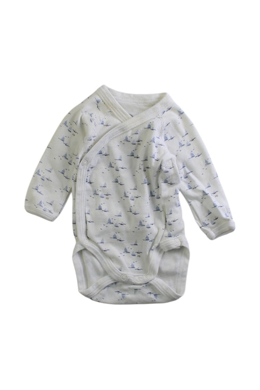 A White Long Sleeve Bodysuits from Petit Bateau in size Newborn for boy. (Front View)